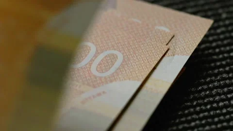 Stack of 100 dollars bills, counting hundred Canadian dollars on the table Video stock 163140608