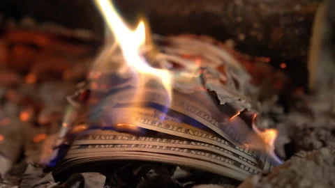Stack of 100 dollars bills flaming in slow motion Stock Footage 255023493