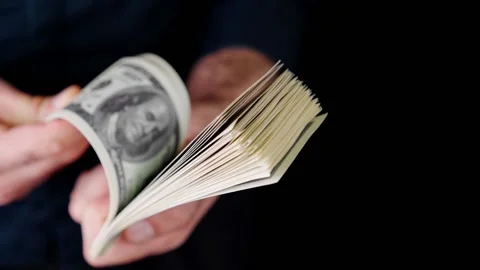 A stack of 100 US dollars banknotes Stock Footage 202612669