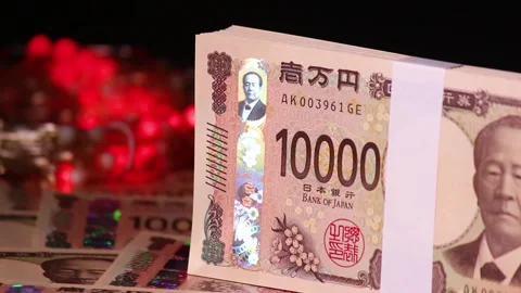 A stack of 10,000 yen notes and illuminations Stock Footage 306502474