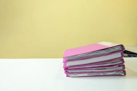 Stack of account file documents on white desk 写真素材