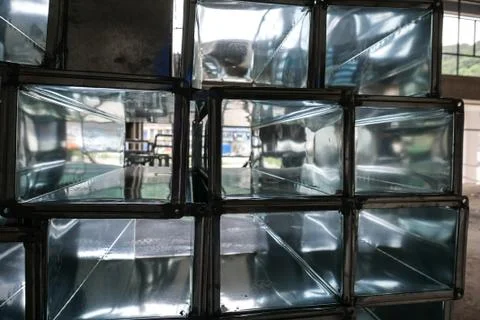 Stack of Aircon Ducts in Construction Site Foto stock