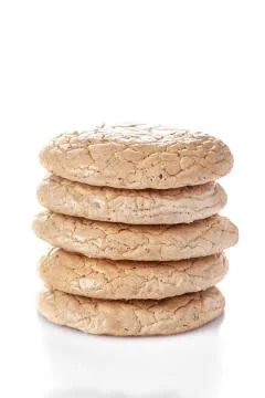 Stack of almond cookies isolated Stock Photos