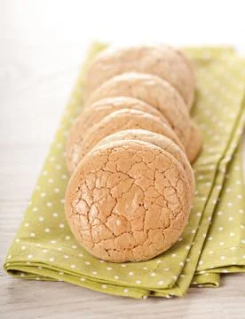 Stack of almond cookies on table Stock Photos