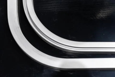 A stack of aluminum structural profiles Stock Photos