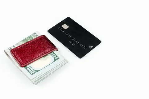 Stack of american dollars cash and black credit card isolated on a white back Stock Photos