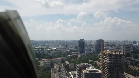 Stack of american dollars on urban background. A lot of American dollars on t Stock Footage 111160638