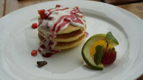 Stack of american pancake with strawberry Stock Photos