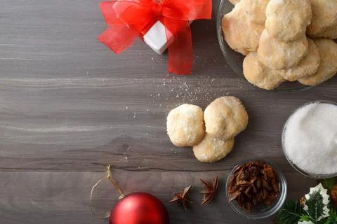Stack of anise and sugar cookieson dark wooden bench Stock Photos
