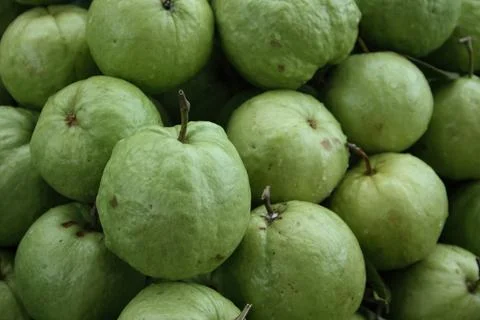Stack of apple guavas on a market stall Stock Photos