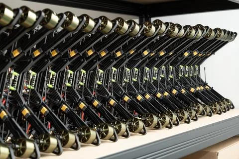 A stack of assembled FPV drone bodies with flight controllers, engines, eac.. Stockfoto's