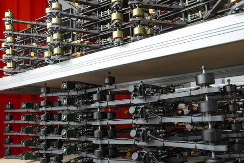 A stack of assembled FPV drone bodies with flight controllers, engines, and.. 스톡 사진