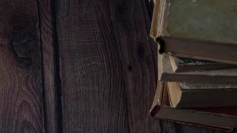 Stack of authentic retro shabby paper books on table 스톡 사진