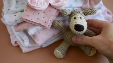 Stack of Baby bodysuits Stock Footage 272452088