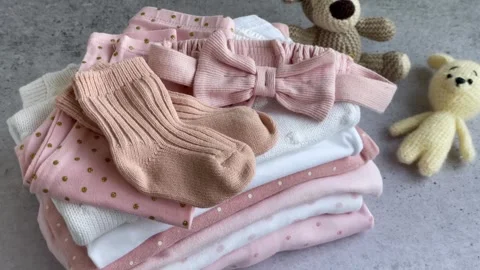 Stack of Baby bodysuits Stock Footage 273548455