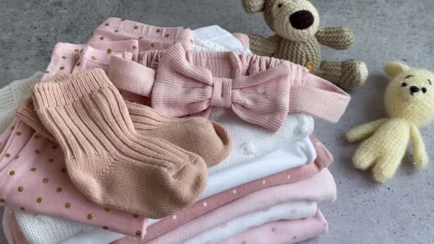 Stack of Baby bodysuits Stock Footage 273674566