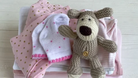 Stack of Baby bodysuits Stock Footage 273766096