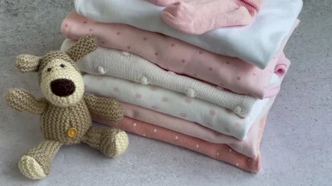 Stack of Baby bodysuits Stock Footage 273766143