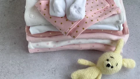 Stack of Baby bodysuits Stock Footage 274186436