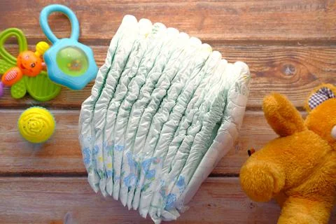 Stack of baby diaper on table, Stock Photos