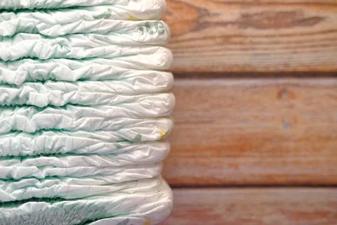 Stack of baby diaper on table, Stock Photos