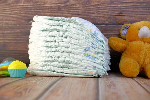 Stack of baby diaper on table, Stock Photos
