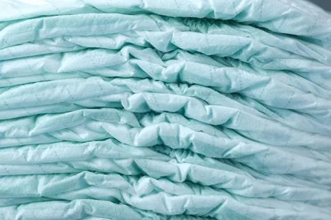 Stack of baby diaper on table, Stock Photos