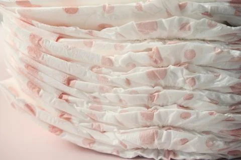 Stack of baby diaper on table, Stock Photos