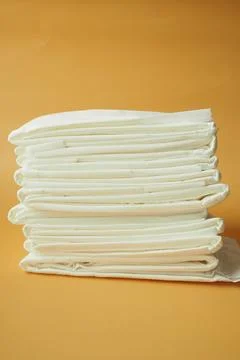 Stack of baby diaper on table, Stock Photos