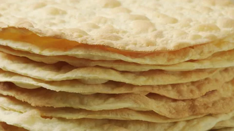 Stack of Baked Cake Layers Rotating. Close-up Stock Footage 324160393