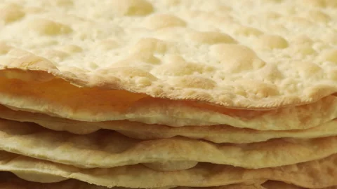 Stack of Baked Cake Layers Rotating. Close-up Stock Footage 324160484