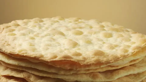 Stack of Baked Cake Layers Rotating. Close-up Stock Footage 324160576