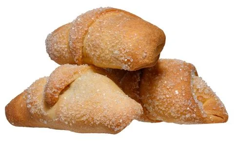 A stack of baked croissants sprinkled with coarse sugar Stock Photos