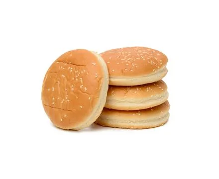 Stack of baked round burger buns isolated on white background Foto stock