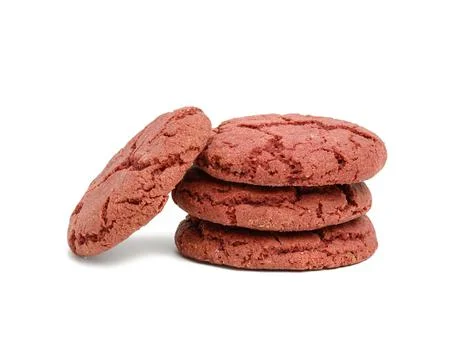 Stack of baked round cookies with cherries on a white background Foto stock