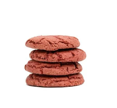 Stack of baked round cookies with cherries on a white background Stock-Fotos