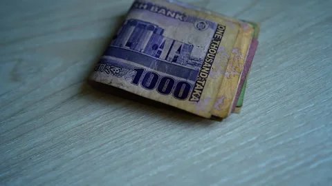Stack of Bangladeshi Taka Banknotes, A stack of folded Bangladeshi Taka ban.. Vídeo Stock 304911466