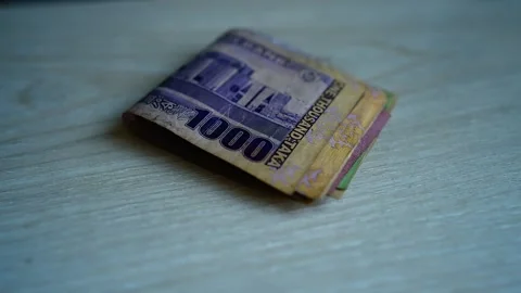 Stack of Bangladeshi Taka Banknotes, A stack of folded Bangladeshi Taka ban.. 動画素材 304911505