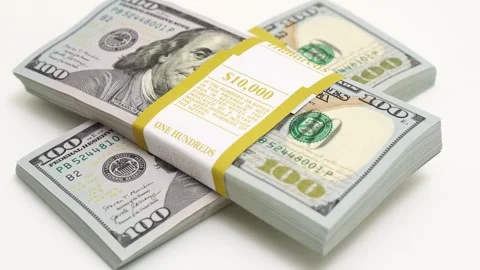 Stack of bank bundles with US dollars on a white background. Close-up shot of Stock Footage 246408950