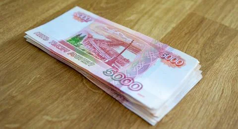 A stack of banknotes of the Russian Federation. Close-up of Russian rubles on Stock Photos