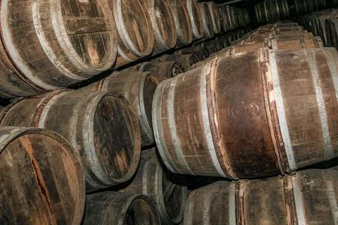 A stack of barrels with the top barrel being the largest Stock Photos
