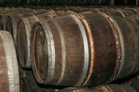 A stack of barrels with the top barrel being the largest Stock Photos