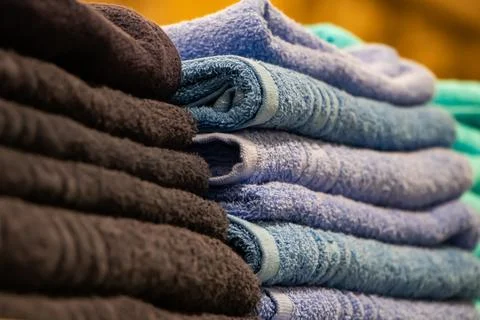 A stack of bath towels close-up. Spa accessories for health care. Stock Photos