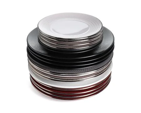 Stack of beautiful ceramic plates isolated on white Stock Photos