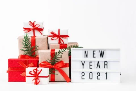 Stack of beautiful gift boxes on white background. Festive New Year concept. Stock Photos