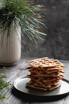 Stack of Belgian waffles on dark background Stock Photos