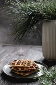 Stack of Belgian waffles on dark background Stock Photos