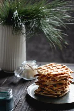 Stack of Belgian waffles on dark background Stock Photos