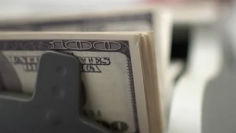 Stack bills hundred dollars is considered in the machine for the account of Stock Footage 150622041
