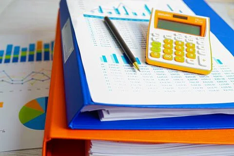 Stack of binder file folder on table in business modern office..on wooden d.. Foto stock